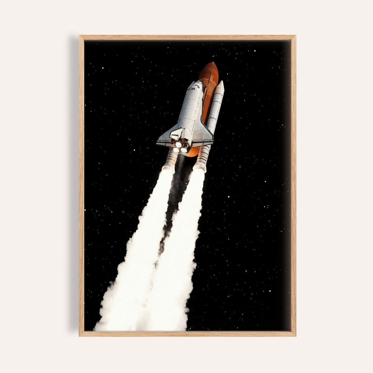 Framed Rocket Launch wall art showing a space shuttle launch with smoke trails against a black starry sky