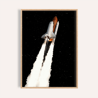 Framed Rocket Launch wall art showing a space shuttle launch with smoke trails against a black starry sky
