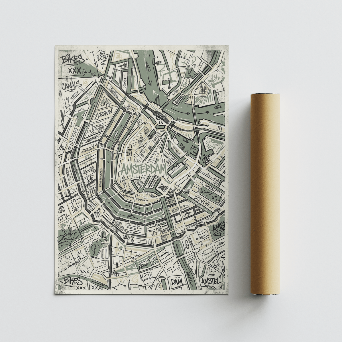Amsterdam Map Art Print rolled on a white surface showing green and black details of the city map