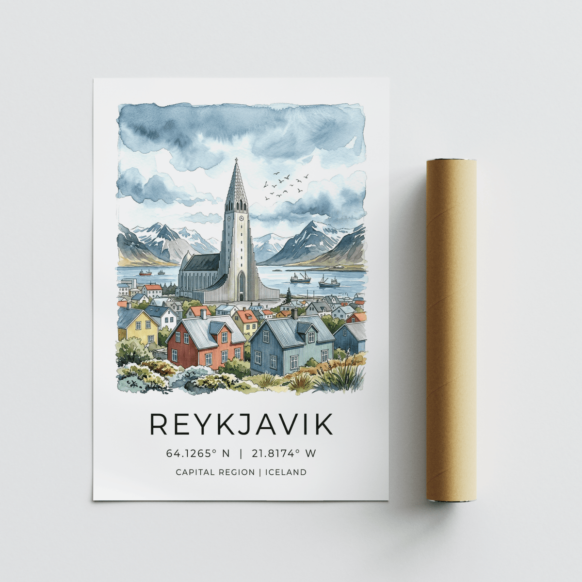 Reykjavik Watercolor Art Print showing illustrated church with colourful houses and mountains alongside packaging tube