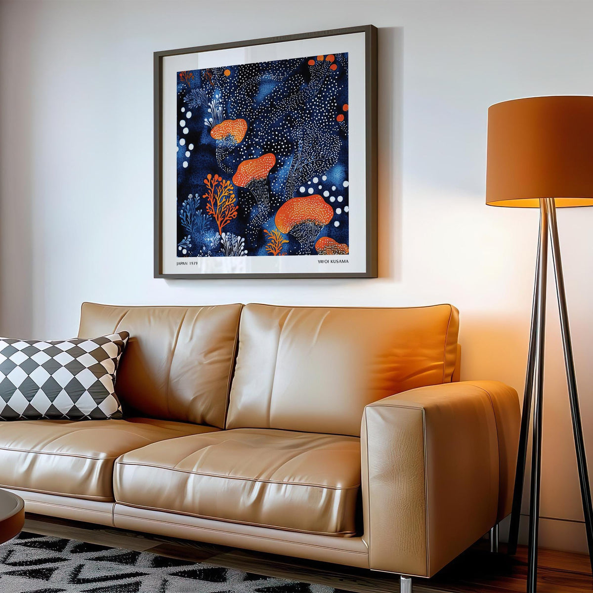 Abstract floral art above a tan leather sofa with orange mushrooms and blue dots