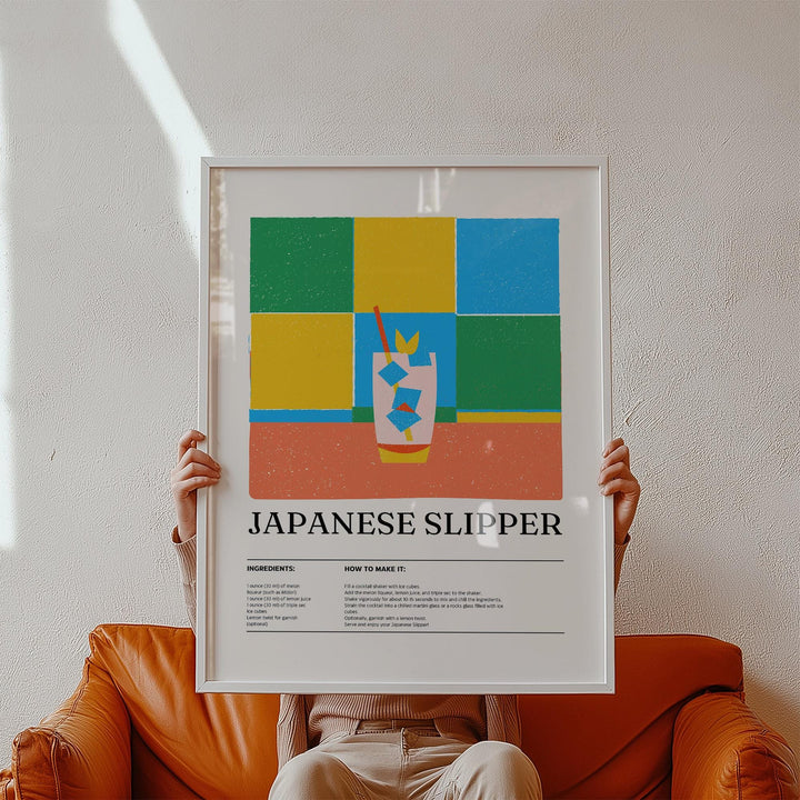 Framed print held in hands with minimalist colourful blocks and Japanese slipper cocktail illustration