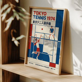 Framed Tokyo Tennis Poster leaning on a wooden shelf with leafy shadows cast over it