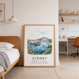 Print leaning on floor of Sydney watercolour art print showing Harbour Bridge and Opera House with floral foreground