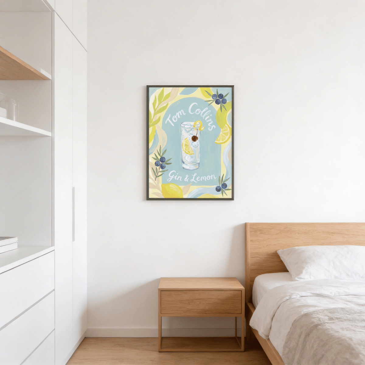 Tom Collins art print of watercolour cocktail with lemon and blueberry accents in a bedroom