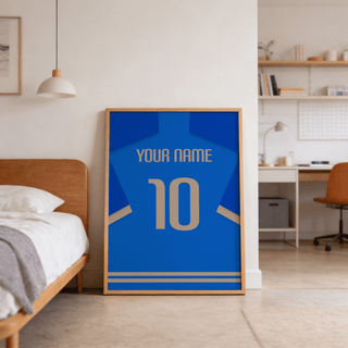 Football Shirt Poster in Blue with Beige Number leaning on the floor next to a bed and pendant lamp