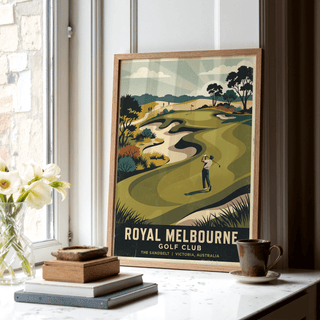 Print leaning on a shelf showing Royal Melbourne Golf Art with a golfer in retro style and muted greens with a cup nearby