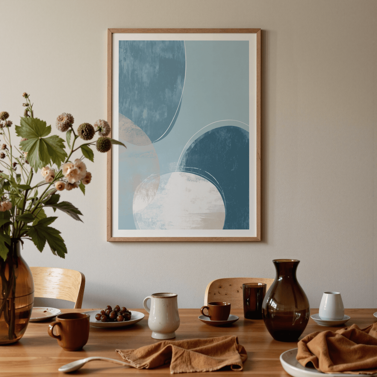 Abstract Blue Art Print of blue and beige circles above a dining table with crockery and a brown jug