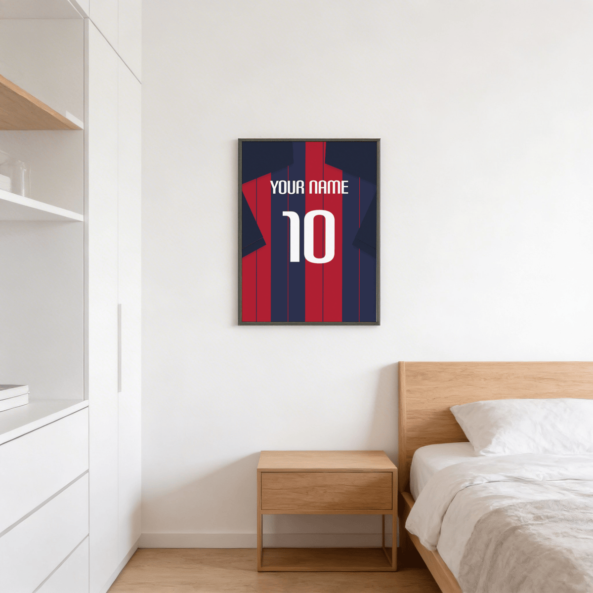 Football Shirt Poster in Navy and Red Stripes hanging in a bedroom above a wooden bedside table and bed