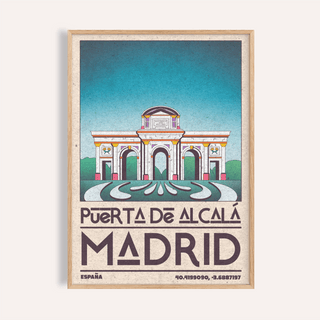 Framed Madrid Architecture Poster of the Puerta de Alcalá gateway with blue sky and retro style
