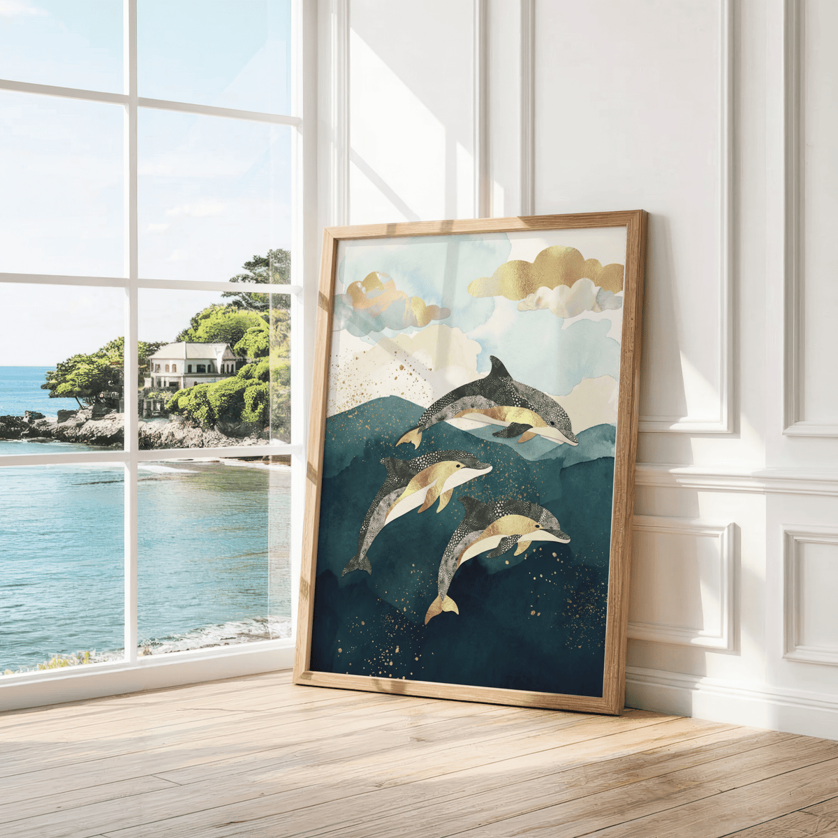 Dolphins Poster print leaning on floor by a large window with sea view in a white room