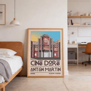 Madrid Landmark Poster leaning on bedroom floor with red cinema facade illustration and blue sky