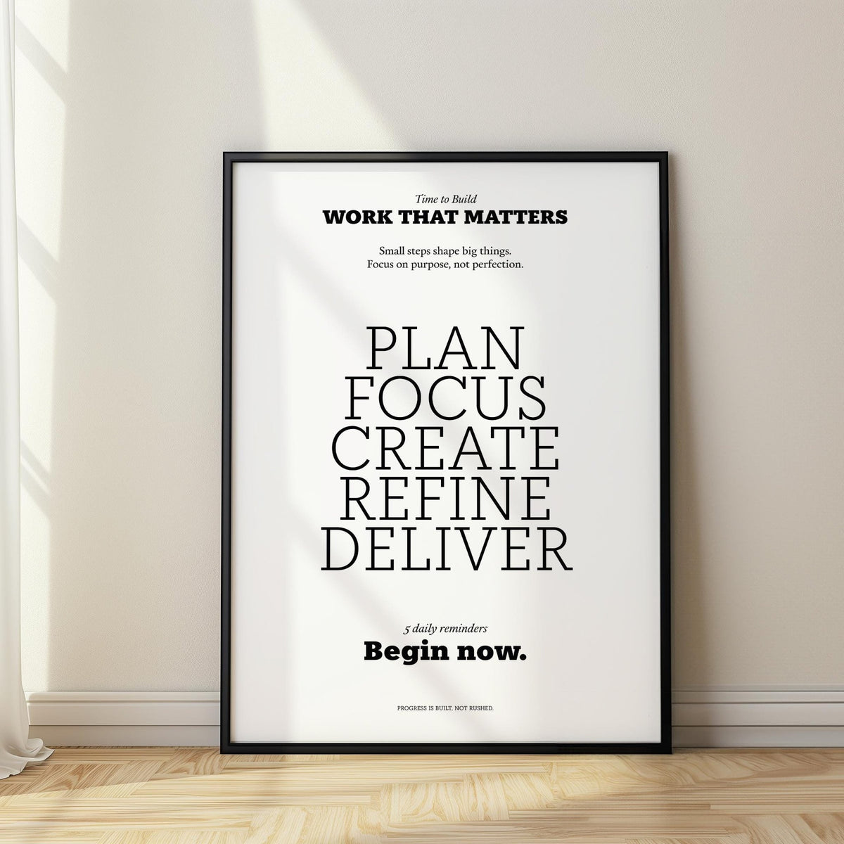 Motivate Quote Poster print leaning on a floor with natural light cast on white wall