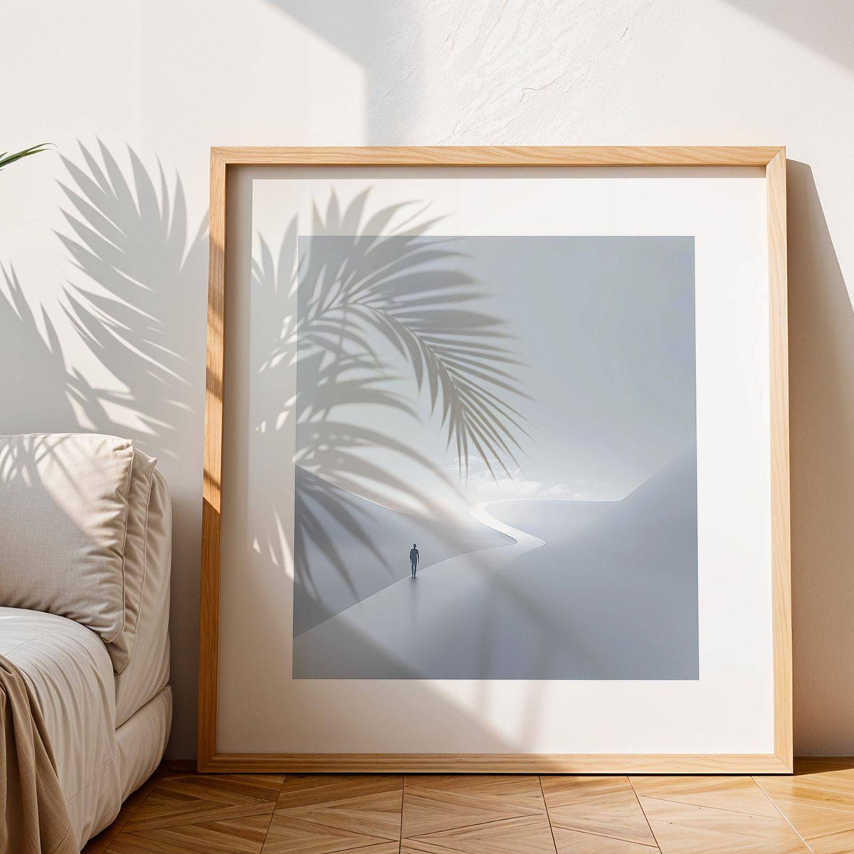 Gray and White Wall Art of a person on a winding path in a minimalist style with shadows of a palm plant nearby