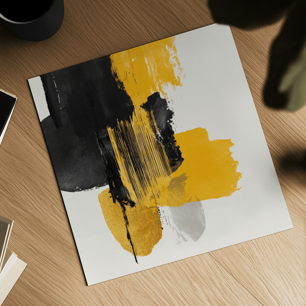 Abstract Poster Art close-up of black and yellow brushstrokes on a wooden surface with a black cup