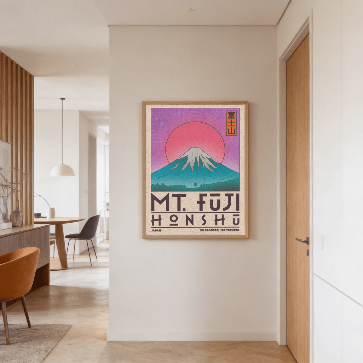 Mt Fuji Art Print on a white wall in a hallway with wood door and dining area visible