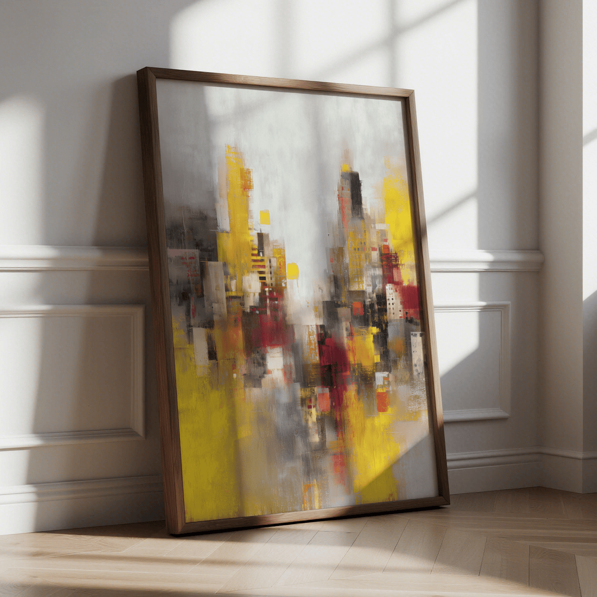 Abstract Cityscape Art Print leaning on a parquet floor with shadows on the wall and warm yellow and red tones