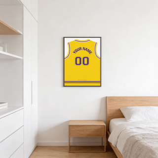 Basketball Jersey Poster in Yellow with Purple Number hanging above a bedside table in a bedroom