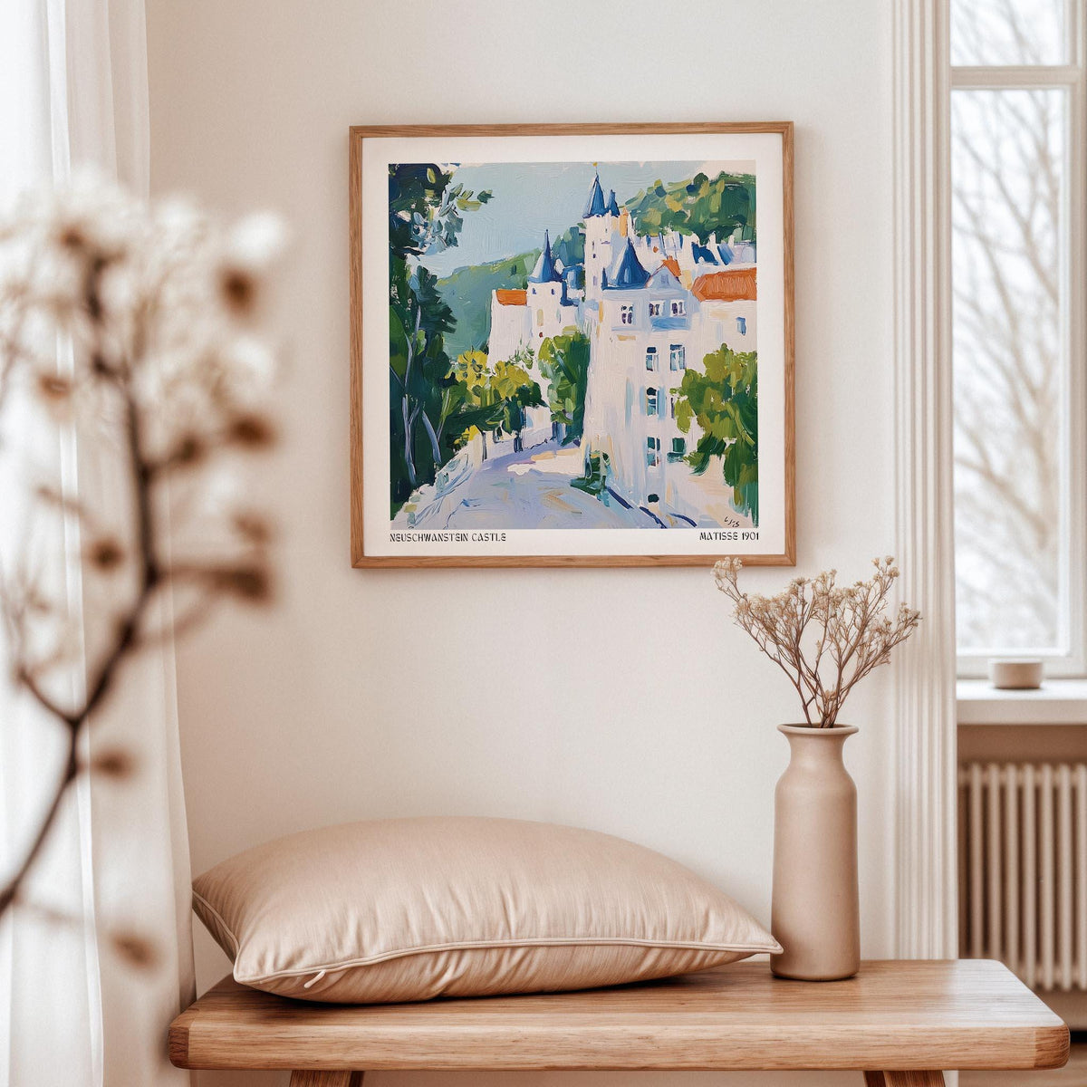 Medieval Castle Art framed print of a watercolour castle with green and blue hues above a beige cushion