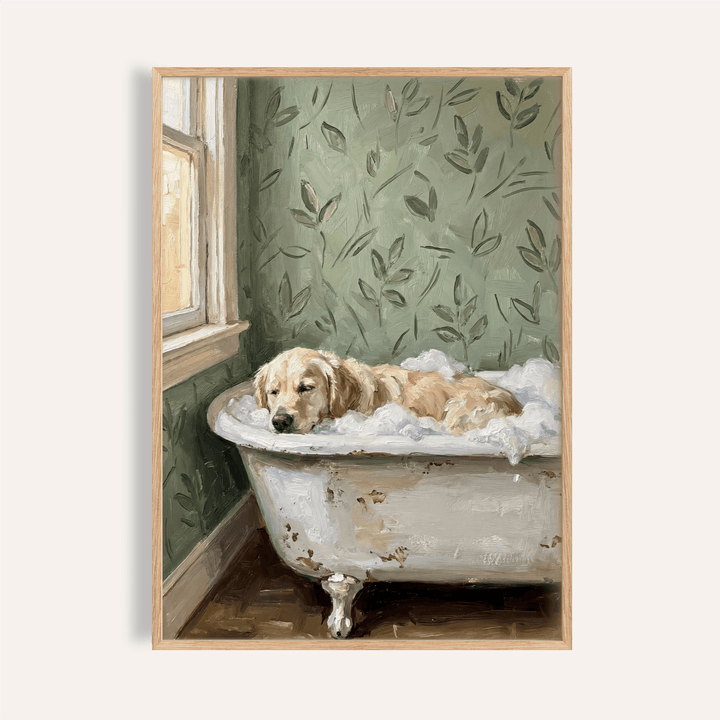 Framed golden retriever wall art of a dog in a bubbly vintage bath with green leafy wallpaper
