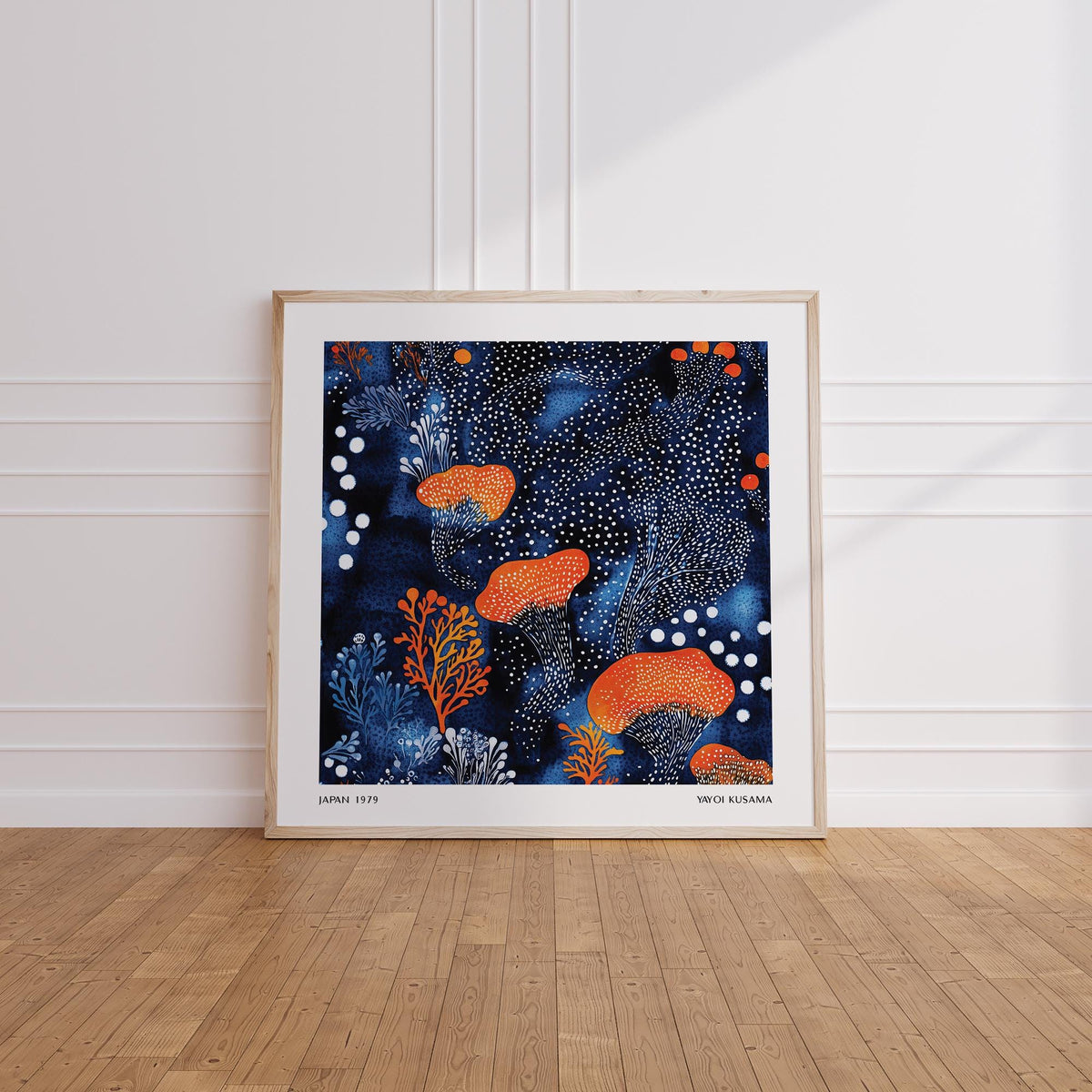 Abstract Floral Art print with orange mushrooms and blue details leaning on a wooden floor