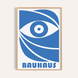 Close-up of Bauhaus framed print with stylised blue eye and bold text