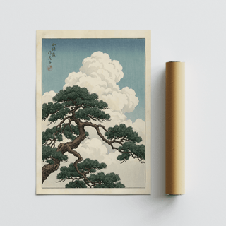 Japanese landscape poster with pine tree branch and white clouds next to a cardboard packaging tube