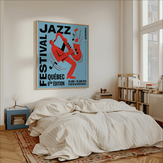 Music wall art of a red saxophone player with blue background above a beige bed