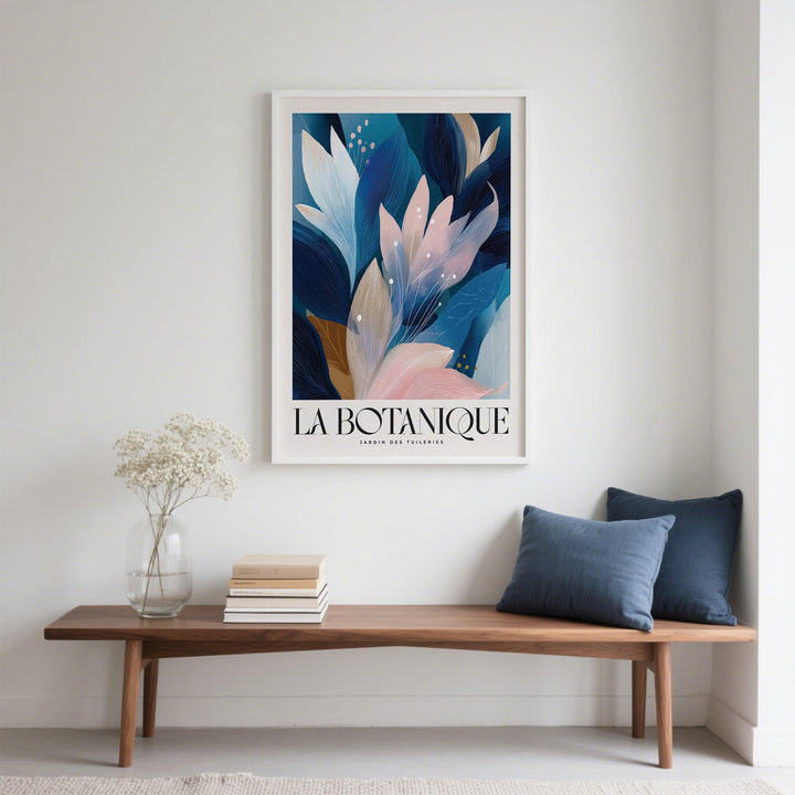 Abstract Botanical Art Print with blue and pink leaves above a wooden bench with cushions