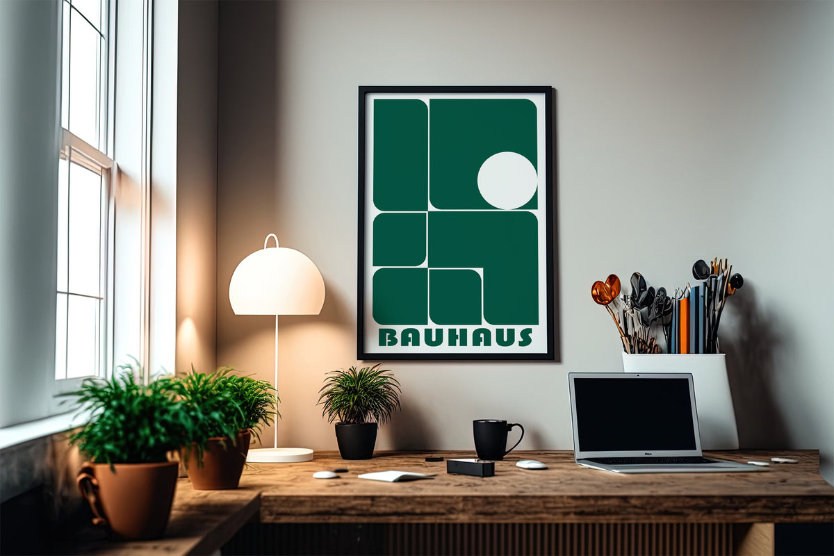 Art for Office framed print with green geometric shapes and the word Bauhaus with a desk lamp nearby