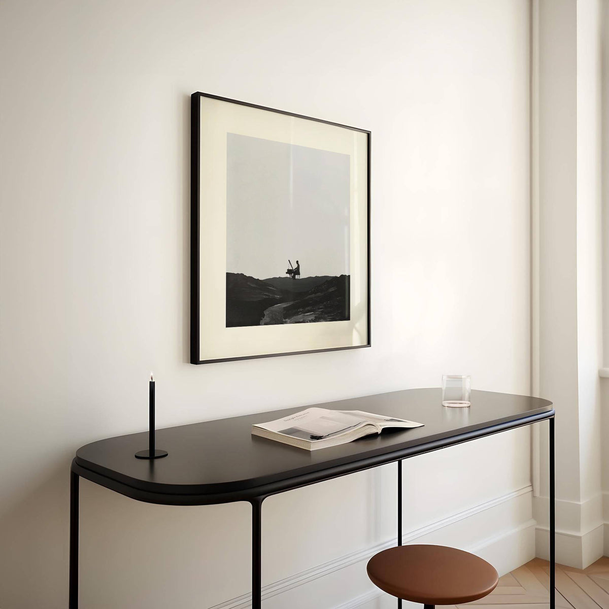 Piano Abstract Art print on a wall with black and grey minimalist piano silhouette above a black console table