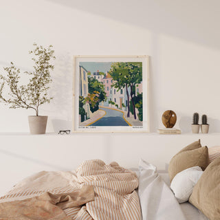 Notting Hill Poster print leaning on a shelf with neutral decor and brown bed cushions