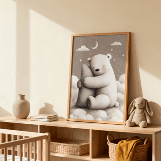 Framed print of a polar bear hugging a pillow in soft grey and white tones on a wooden shelf with a bunny toy