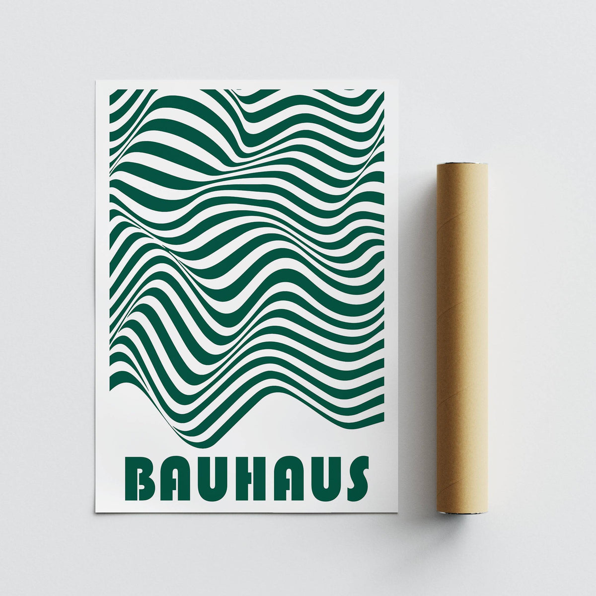 Green and white wall art with green wavy stripes and Bauhaus text beside a packaging tube