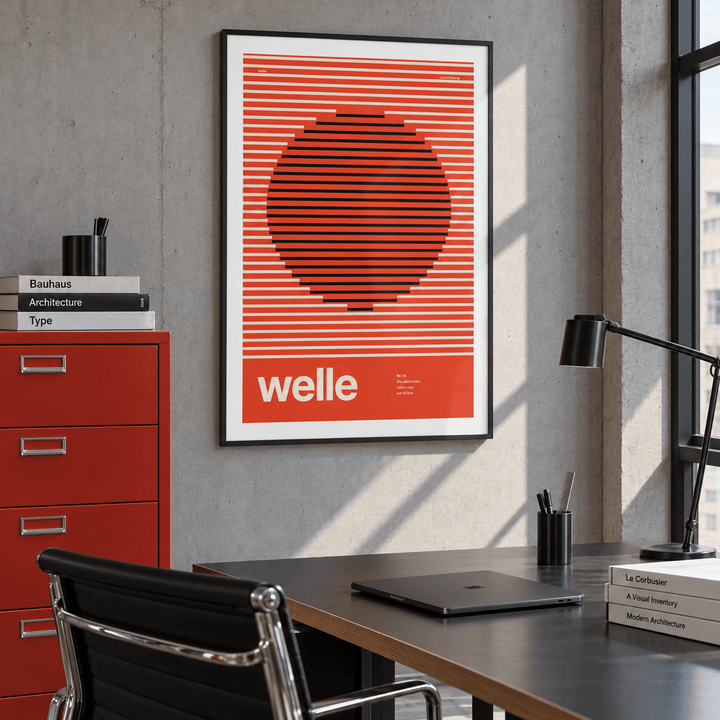 Op art circle in red stripes print above a desk in a home office