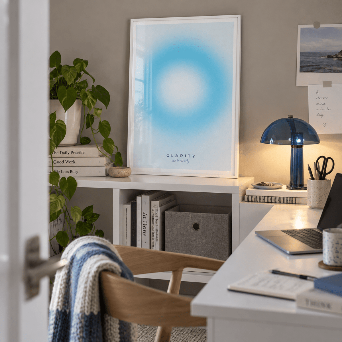 Bright aqua ring gradient print on a shelf in a study