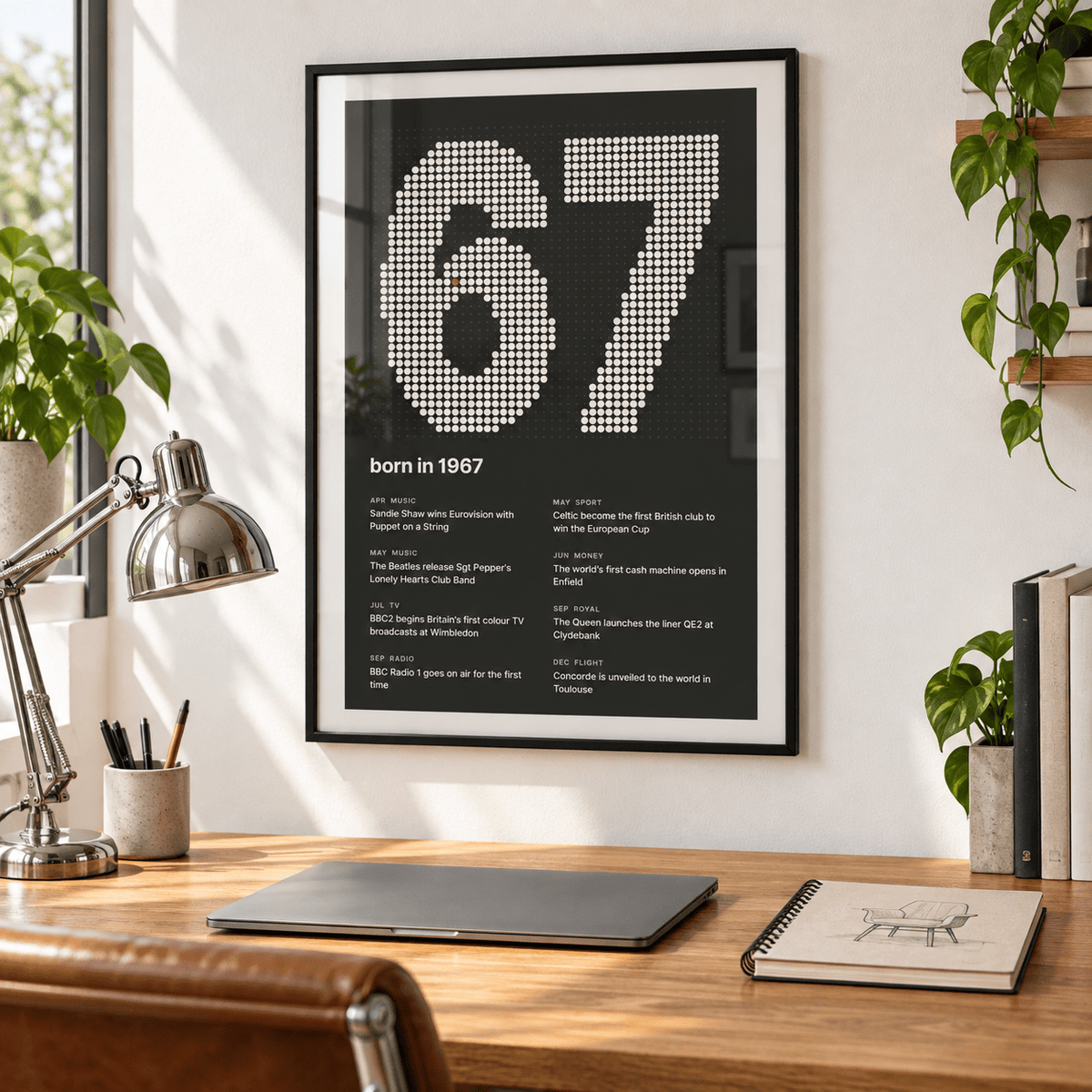 Charcoal halftone print of the year 1967 on a wall in a lived in room