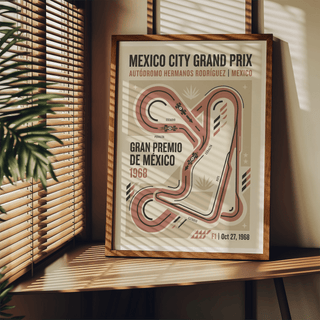 Framed Vintage Race Circuit Map Poster with minimalist Mexico City Grand Prix track in beige and muted red leaning on a wooden shelf