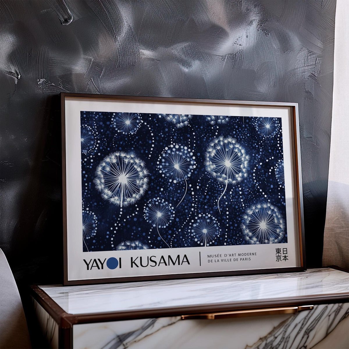 Landscape posters framed print of white dandelion seed heads on dark blue leaning on a marble topped unit