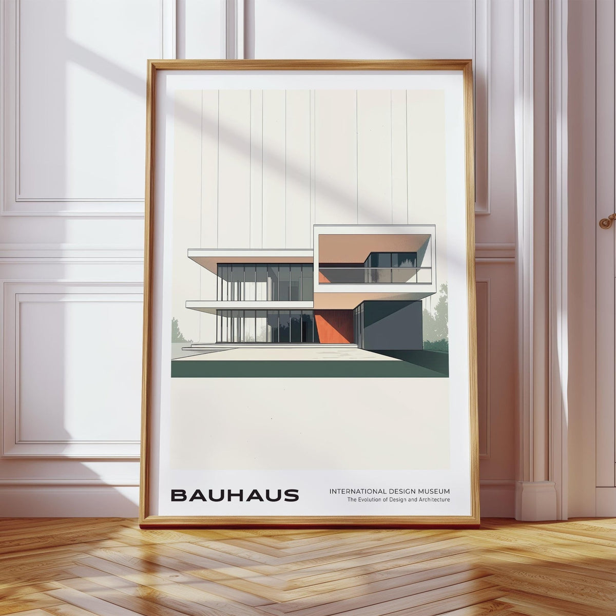 Framed Bauhaus Architecture Poster of a modernist building in beige, green and orange on a wooden floor