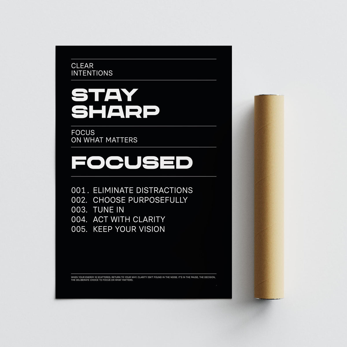 Stay Focused Poster flat with black and white minimalist text design next to a brown packaging tube