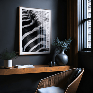 Zebra Stripe Art Print close-up with black and white stripes above a wooden ledge with a vase