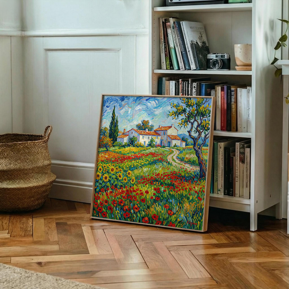 Print leaning on floor of a Van Gogh Painting countryside cottage with yellow and red flowers beside a basket