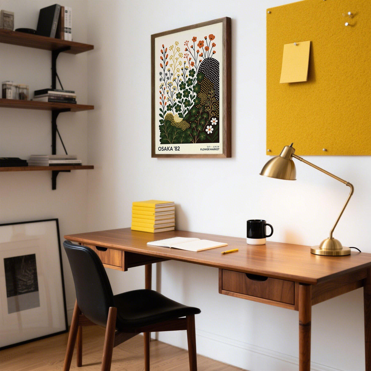 Modern Nature wall art print with clover flowers in muted green and terracotta above a wooden desk in an office