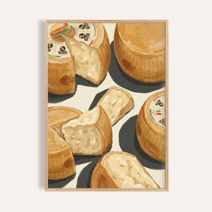 Framed Parmegiano Reggiano Art showing illustrated parmesan cheese wheels and pieces in warm tones