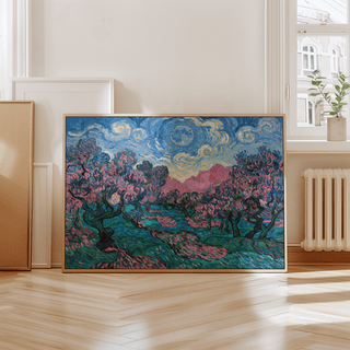 Colorful Landscape Art print leaning on a wooden floor with pink flowering trees and swirling moonlight