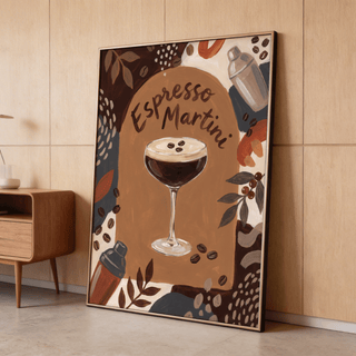 Espresso Martini wall art leaning on a wooden floor with a small wooden sideboard nearby
