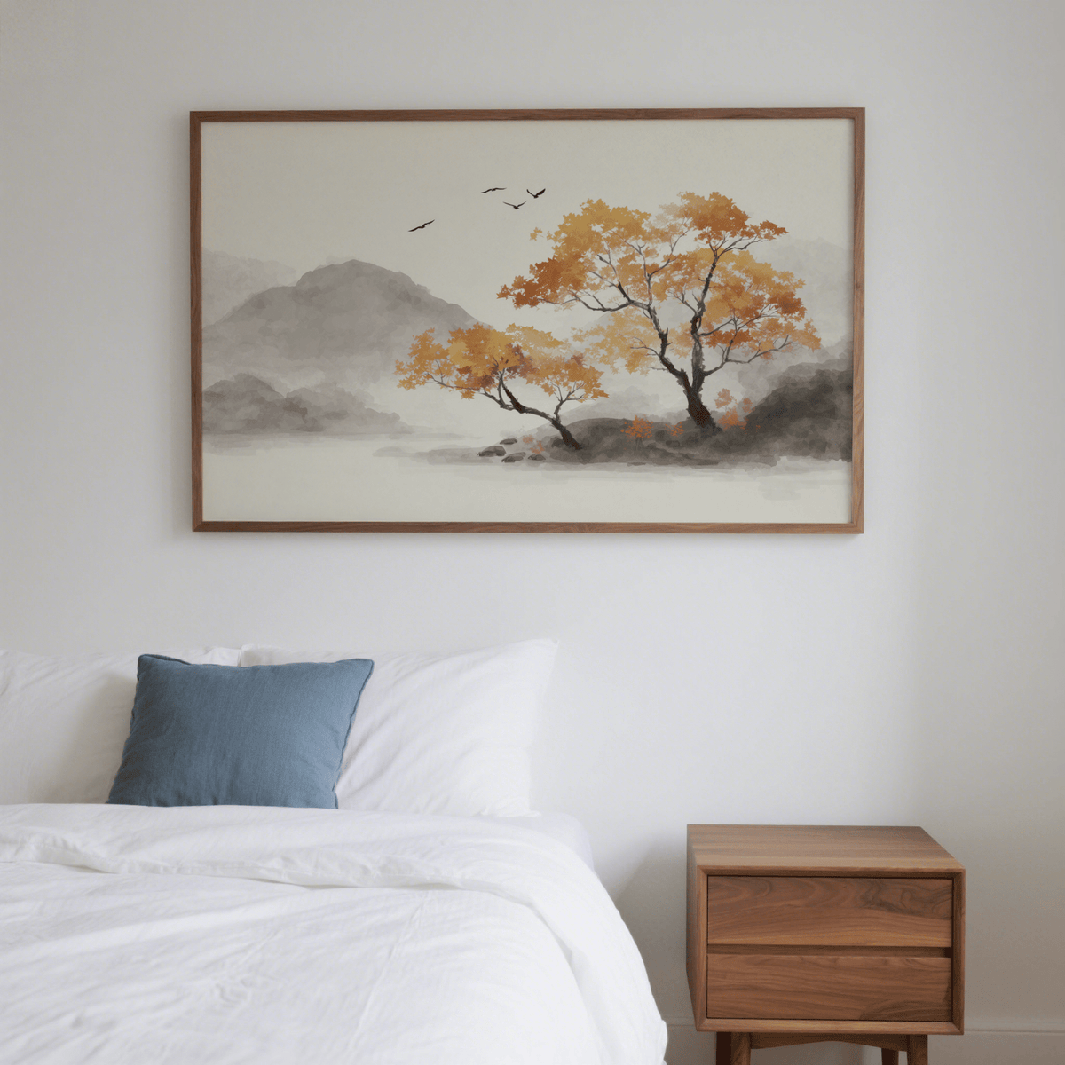Autumn Tree Art Print above a white bed with a blue cushion in a bedroom