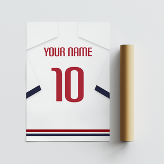 Detail close-up of a football shirt poster in white with navy sleeves and red number beside a packaging tube