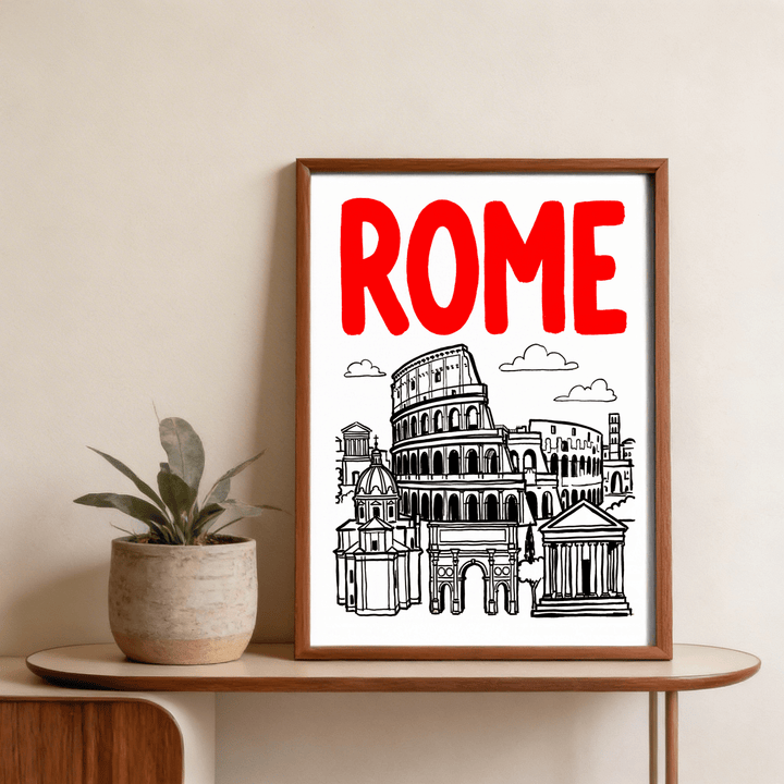 Framed Rome City Art Print with minimalist line art of the Colosseum and Roman buildings on a table next to a potted plant